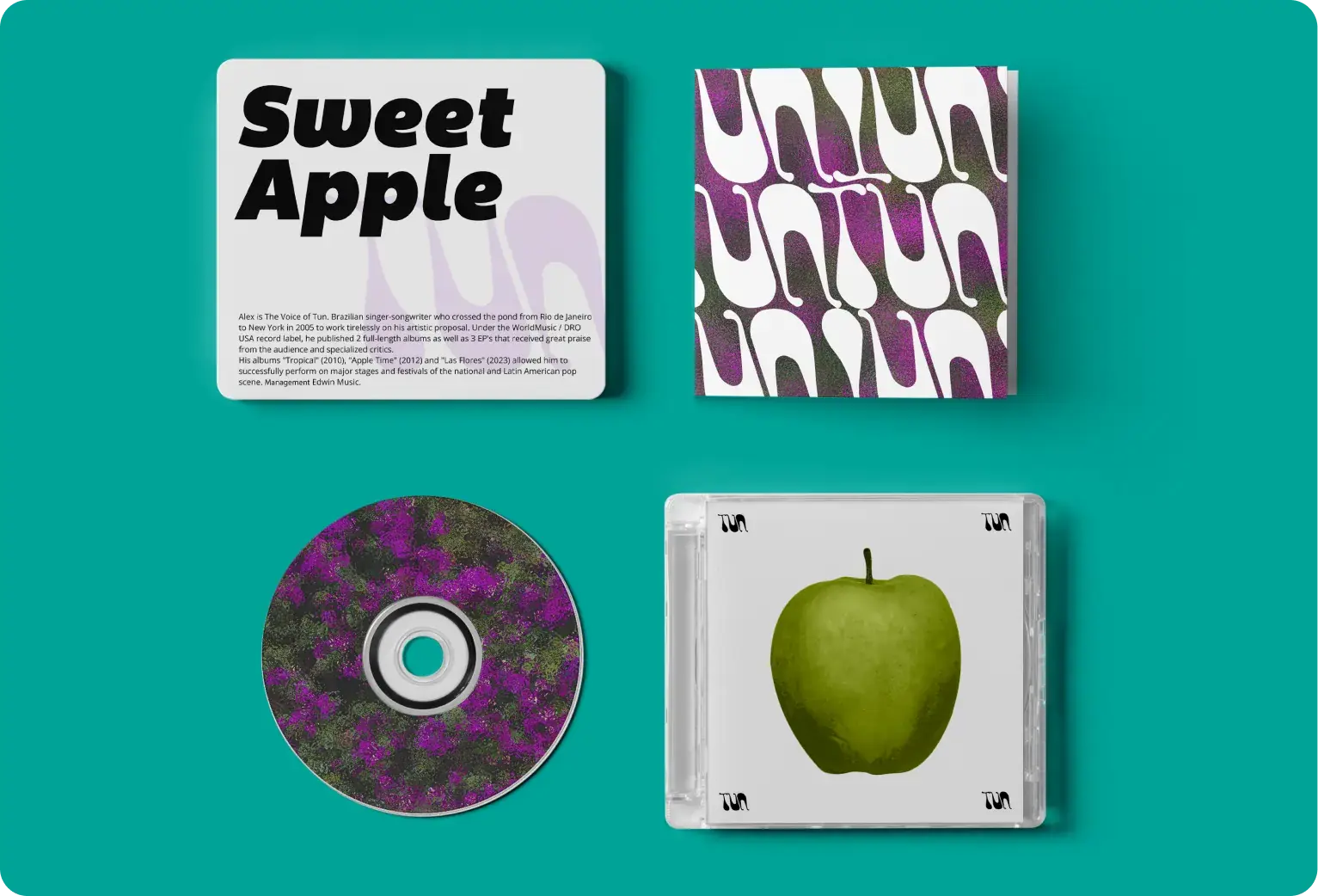Four items laying flat against a teal background: a square card with 'Sweet Apple' text, a box with abstract purple and green patterns, a CD with similar abstract patterns, and a CD case featuring an illustration of a green apple.
